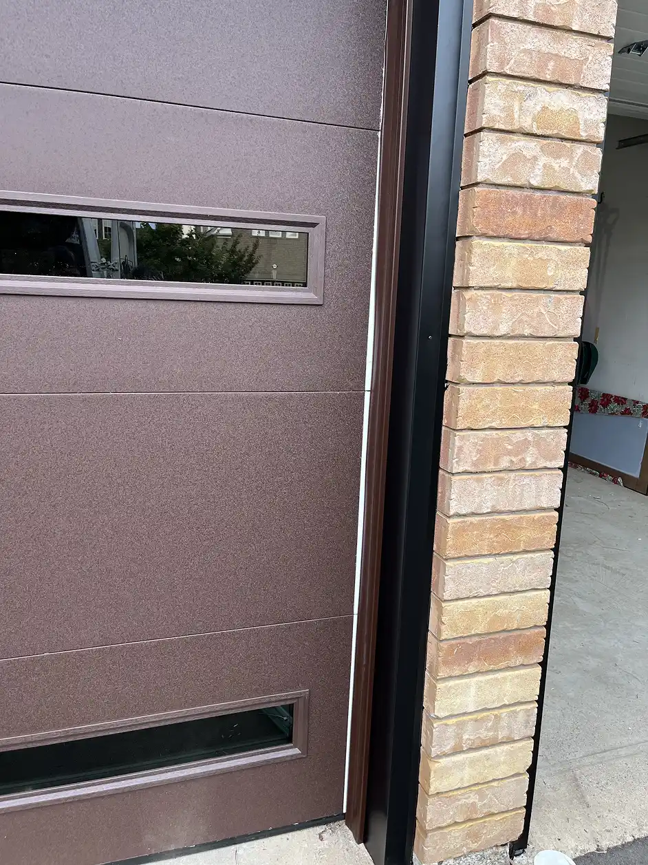 Aluminum capping installed on a garage door frame in Toronto