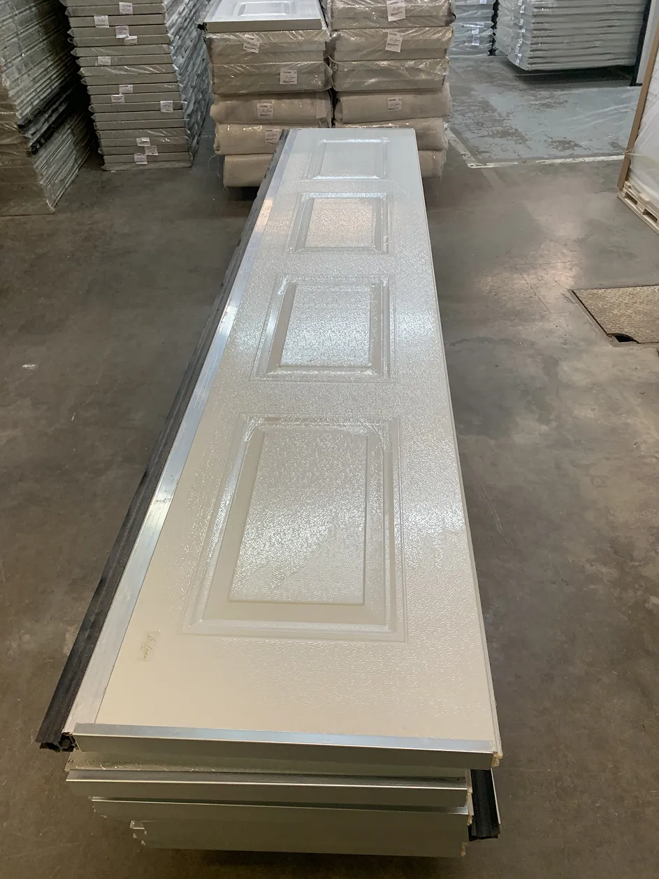 Garage door replacement panels stacked in a warehouse in Toronto